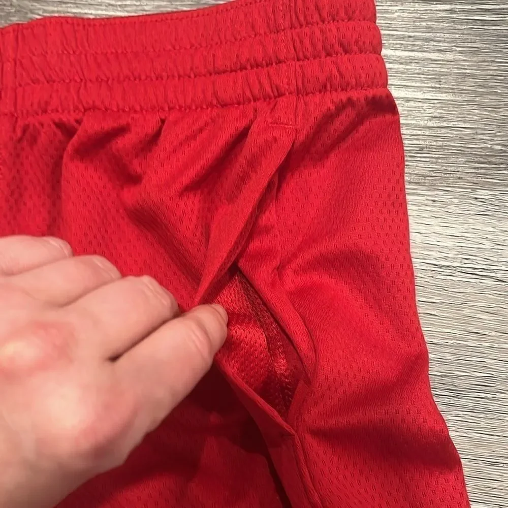 Nike Boys athletic dri-fit shorts red/black with pockets and cinch waist - M